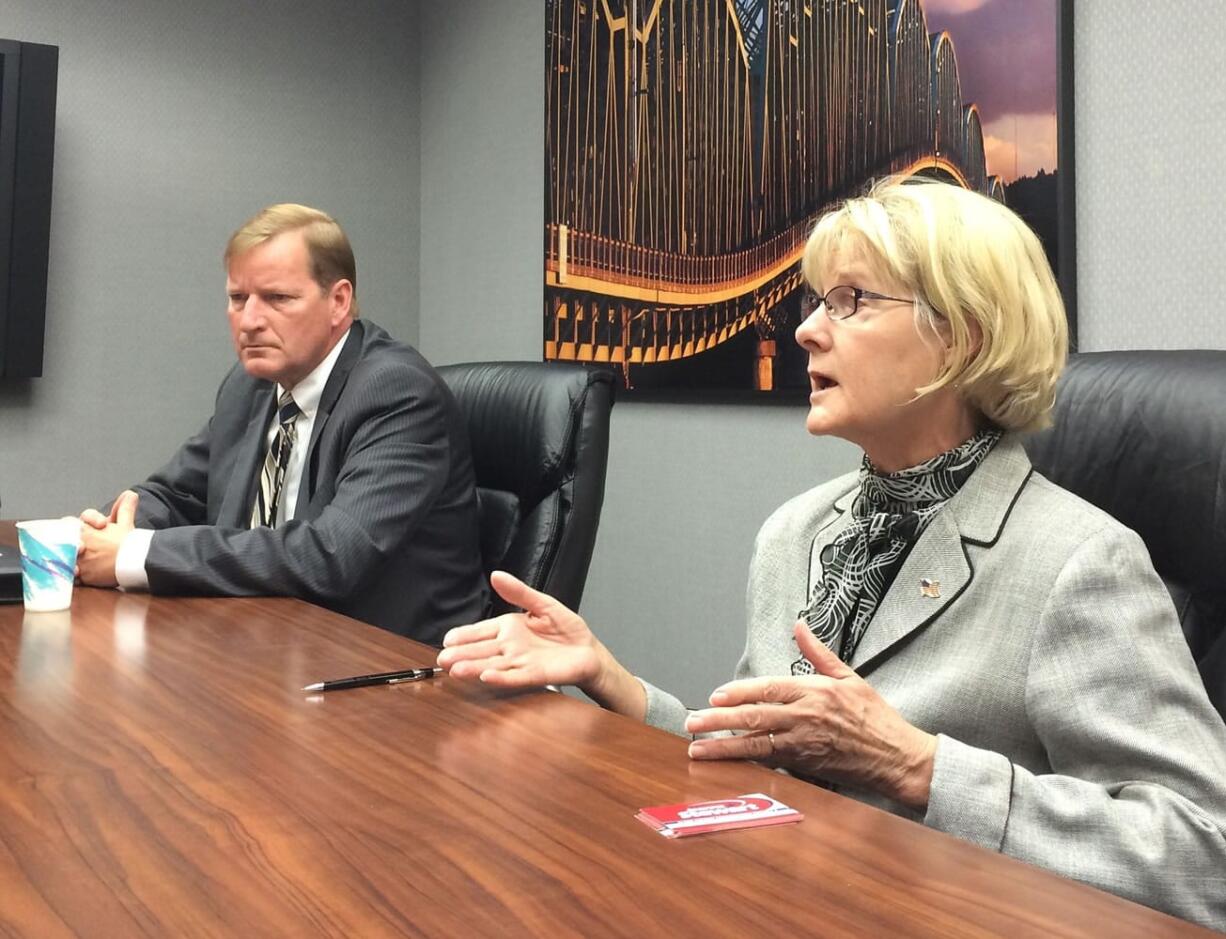 County commissioner candidates Craig Pridemore, left, and Jeanne Stewart meet with The Columbian editorial board on Wednesday in Vancouver.