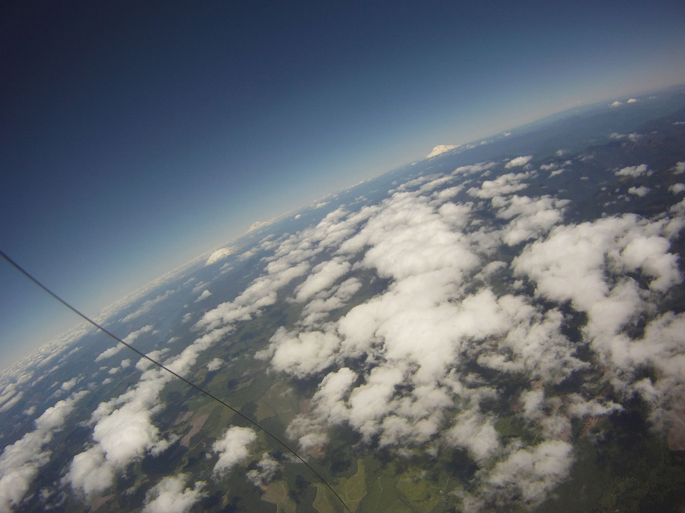 Three mountains in view from ~12,000ft