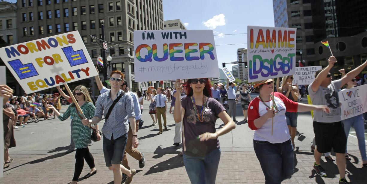 Members of Mormons Building Bridges march June 8 during the Utah Gay Pride Parade, in Salt Lake City.