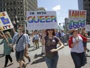 Members of Mormons Building Bridges march June 8 during the Utah Gay Pride Parade, in Salt Lake City.