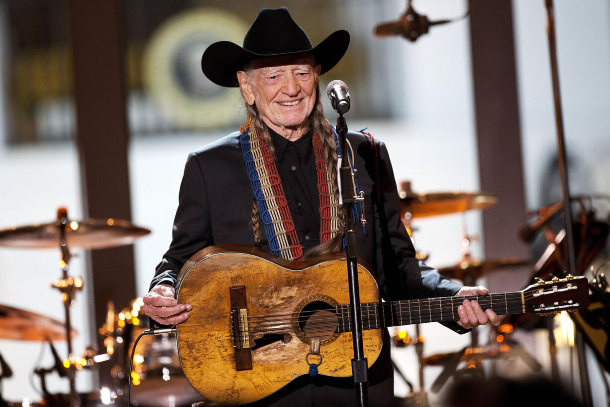 Singer Willie Nelson performs during an &quot;In Performance at the White House&quot; series, attended by President Barack Obama, part of the Joining Forces initiative, an event with musicians, members of the U.S.