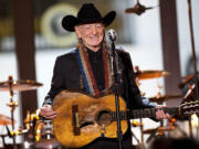 Singer Willie Nelson performs during an &quot;In Performance at the White House&quot; series, attended by President Barack Obama, part of the Joining Forces initiative, an event with musicians, members of the U.S.