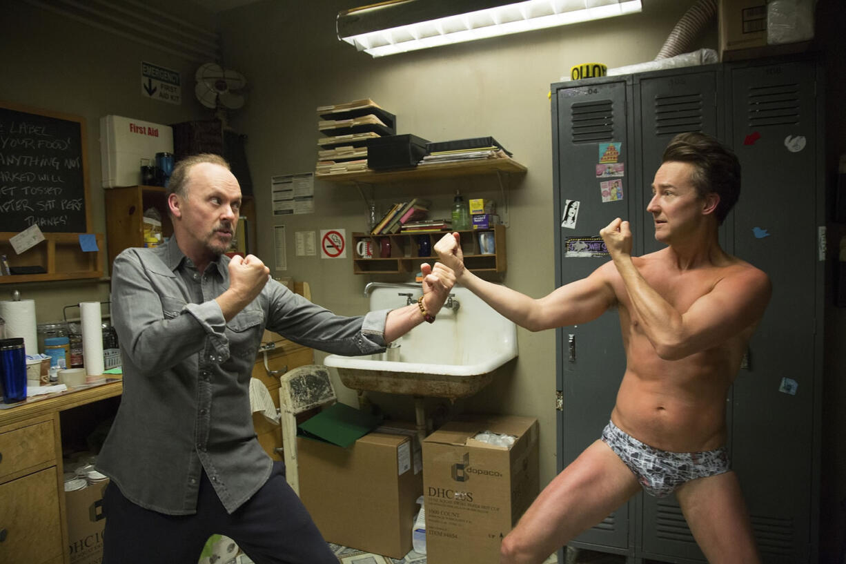 This image released by Fox Searchlight Pictures shows Michael Keaton, left, and Edward Norton in a scene from &quot;Birdman.&quot; Norton was nominated for a Golden Globe for best supporting actor in a drama for his role on Thursday, Dec. 11, 2014. The 72nd annual Golden Globe awards will air on NBC on Sunday, Jan. 11.