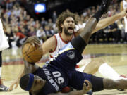 Portland Trail Blazers center Robin Lopez, reacts after he is called for fouling Memphis Grizzlies forward Zach Randolph during Portland's loss on Friday.