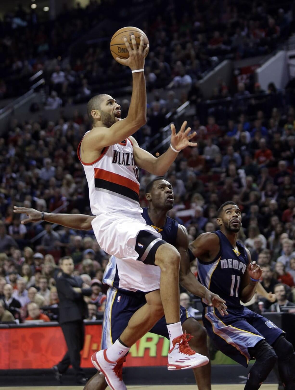 Portland Trail Blazers forward Nicolas Batum drives to the hoop against Memphis on Friday.