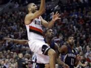 Portland Trail Blazers forward Nicolas Batum drives to the hoop against Memphis on Friday.