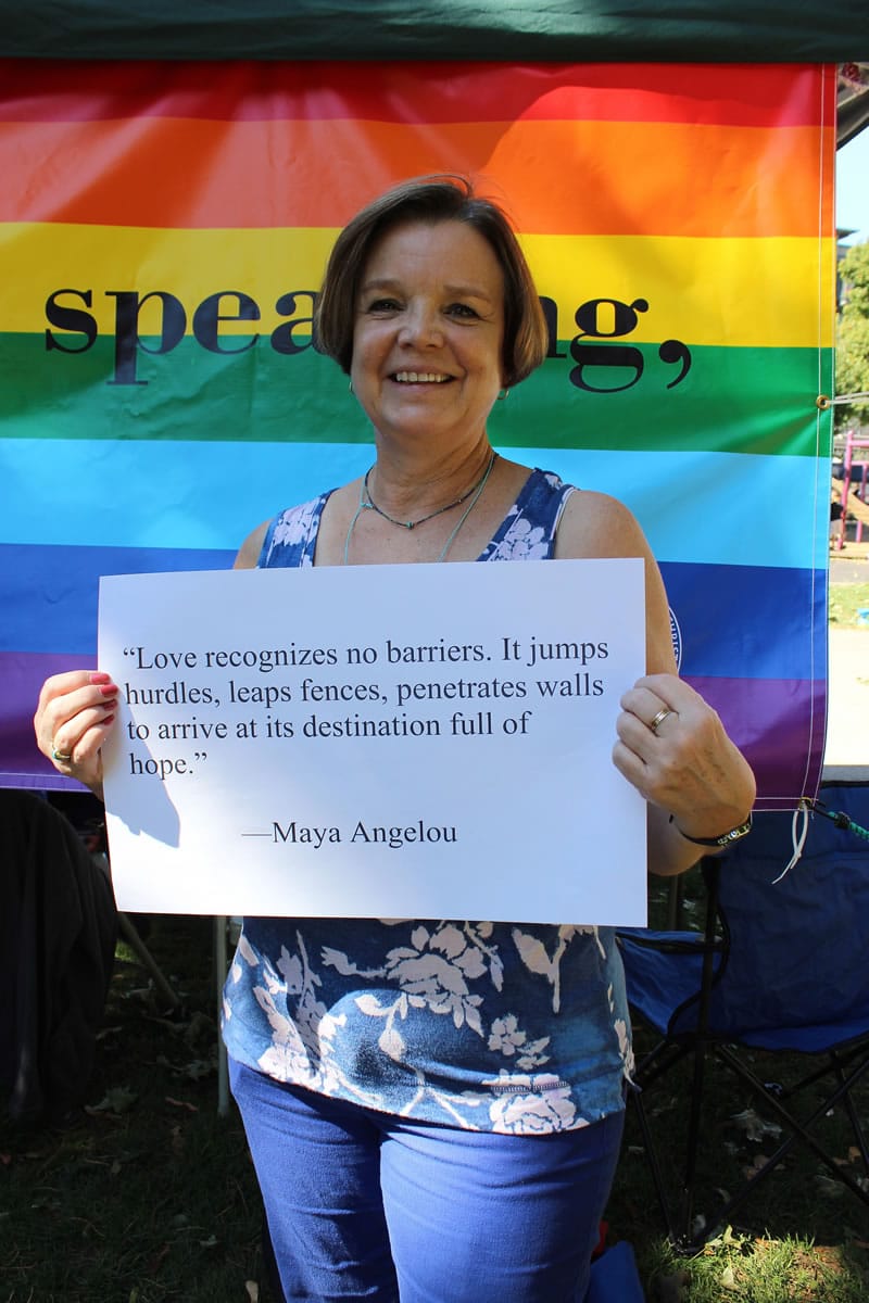 Jean Stolle participates in a photo project at the Peace and Justice Fair.