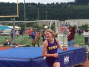 Columbia River's Ellie Walker reacts after clearing 5-foot-4 to win the high jump at the Class 3A bi-district track and field meet Saturday in Sumner.