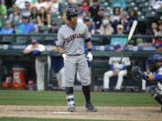 Cleveland Indians' Michael Brantley tosses his bat after he was walked with the bases loaded in the 12th inning  Seattle Mariners, Sunday, May 31, 2015, in Seattle. The Indians beat the Mariners 6-3 in 12 innings. (AP Photo/Ted S.