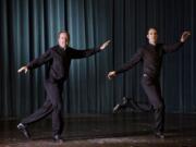 Father David Rider, left, and father John Gibson dance before an interview with the Associated press at the Pontifical North American College in Rome on Monday.