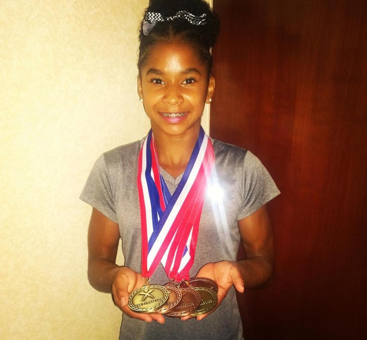 Jordan Chiles from Naydenov Gymnastics in Vancouver, took home the junior all-around title at the 2014 Secret Classic.