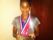 Jordan Chiles from Naydenov Gymnastics in Vancouver, took home the junior all-around title at the 2014 Secret Classic.