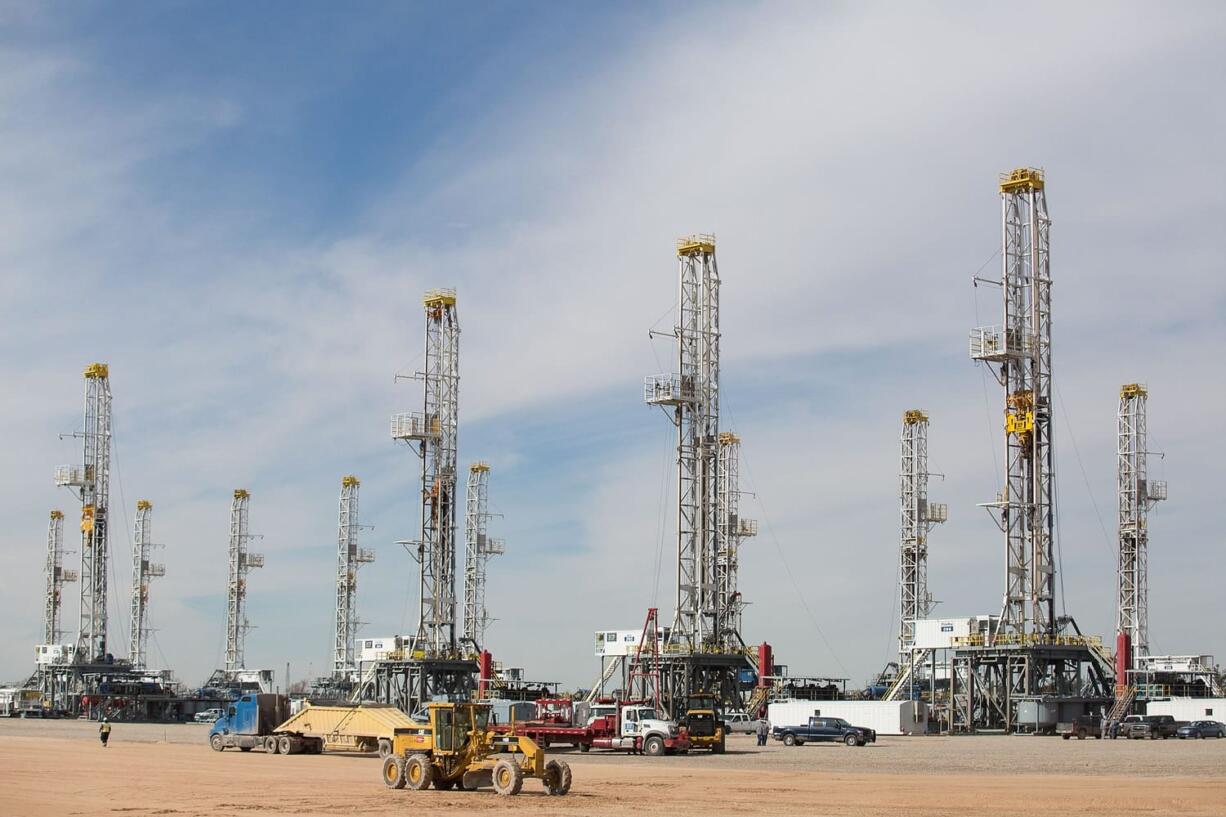 Associated Press files
A number of oil-drilling rigs are idled in the Helmerich