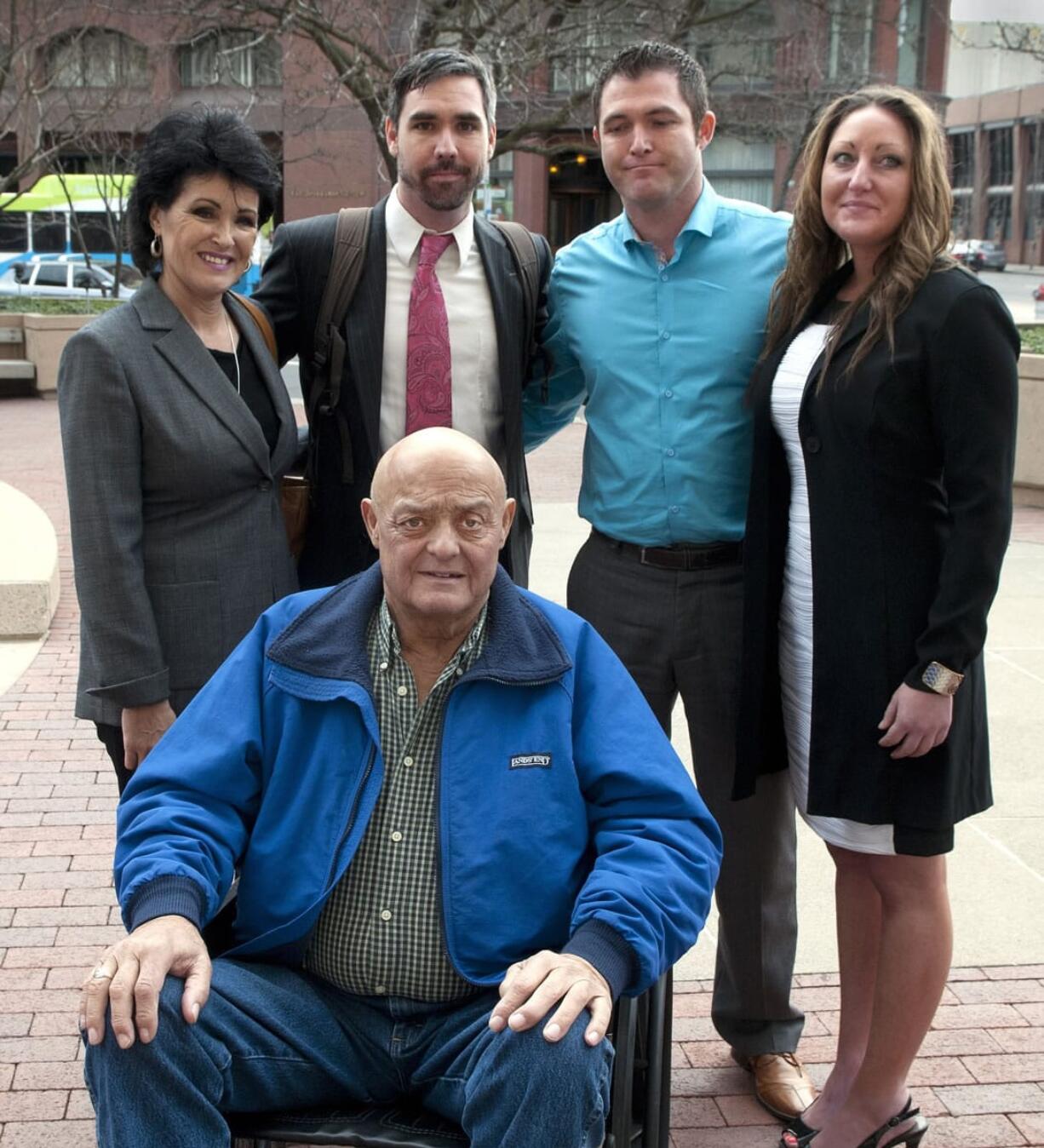 Dan Pelle/The Spokesman-Review
Rhonda Lee Firestack-Harvey, clockwise from left, Jason Zucker, Rolland Gregg, Michelle Gregg and Larry Harvey gather outside the Thomas S. Foley United States Courthouse on Thursday in Spokane. A federal judge later declined to dismiss charges against the &quot;Kettle Falls Five.&quot; A trial is set to begin Feb. 23.