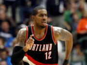 Portland Trail Blazers' free agent LaMarcus Aldridge (12) said in a Twitter post Saturday morning, July 4, 2015, that he will be signing with the San Antonio Spurs.