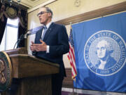 Washington Gov. Jay Inslee talks to the media about the status of ongoing state budget negotiations, Friday, June 19, 2015, in Olympia, Wash. Inslee says new taxes are off the table, and he encouraged the House and Senate to consider closing some tax exemptions as a compromise.