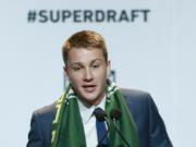 Nick Besler speaks after being selected by the Portland Timbers in the first round of the 2015 Major League Soccer SuperDraft, Thursday, Jan. 15, 2015, in Philadelphia.