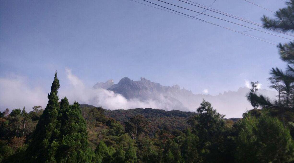 Mount Kinabalu is photographed hours after a magnitude 5.9 earthquake shook the area Friday in Kundasang, Sabah, Malaysia.