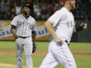 lm otero/Associated Press
Seattle pitcher Fernando Rodney, left, trudges off the field as Ryan Strausborger walks home from third base to score the winning run on a bases-loaded walk.