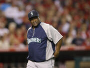 Seattle Mariners manager Lloyd McClendon walks off the field during a game last season.