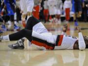 Portland's Wesley Matthews after injuring his left achilles against the Dallas Mavericks during the second half Thursday.