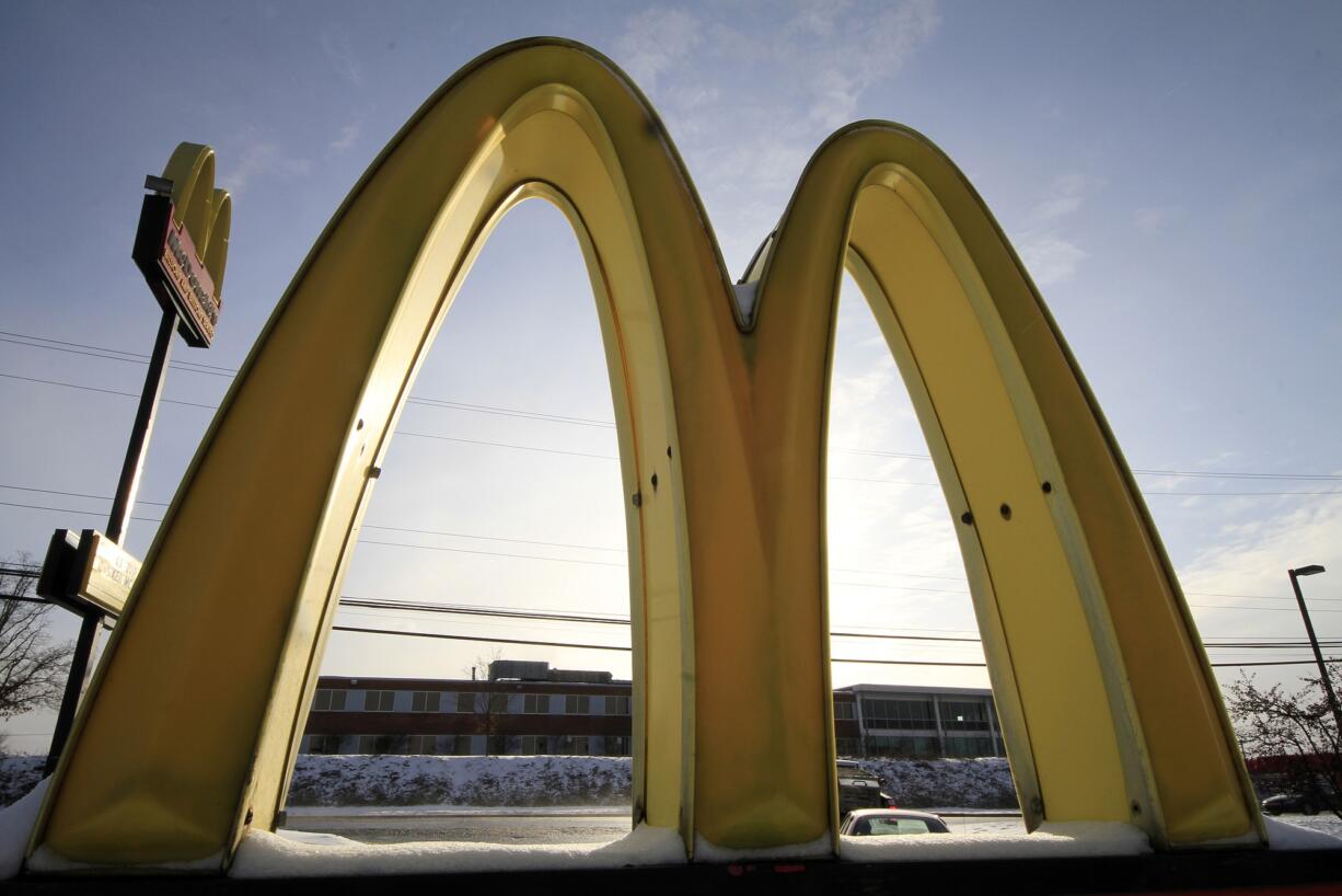 McDonald's Golden Arches at a McDonald's restaurant are covered with snow in Robinson Township, Pa.