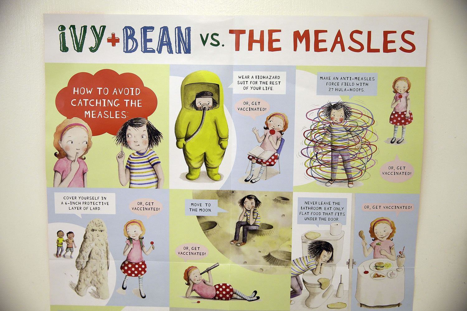 A poster educating parents and children about measles is displayed at the Tamalpais Pediatrics clinic Friday in Greenbrae, Calif.