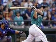 Seattle Mariners' Kyle Seager singles in a run in the first inning Monday against the New York Mets.