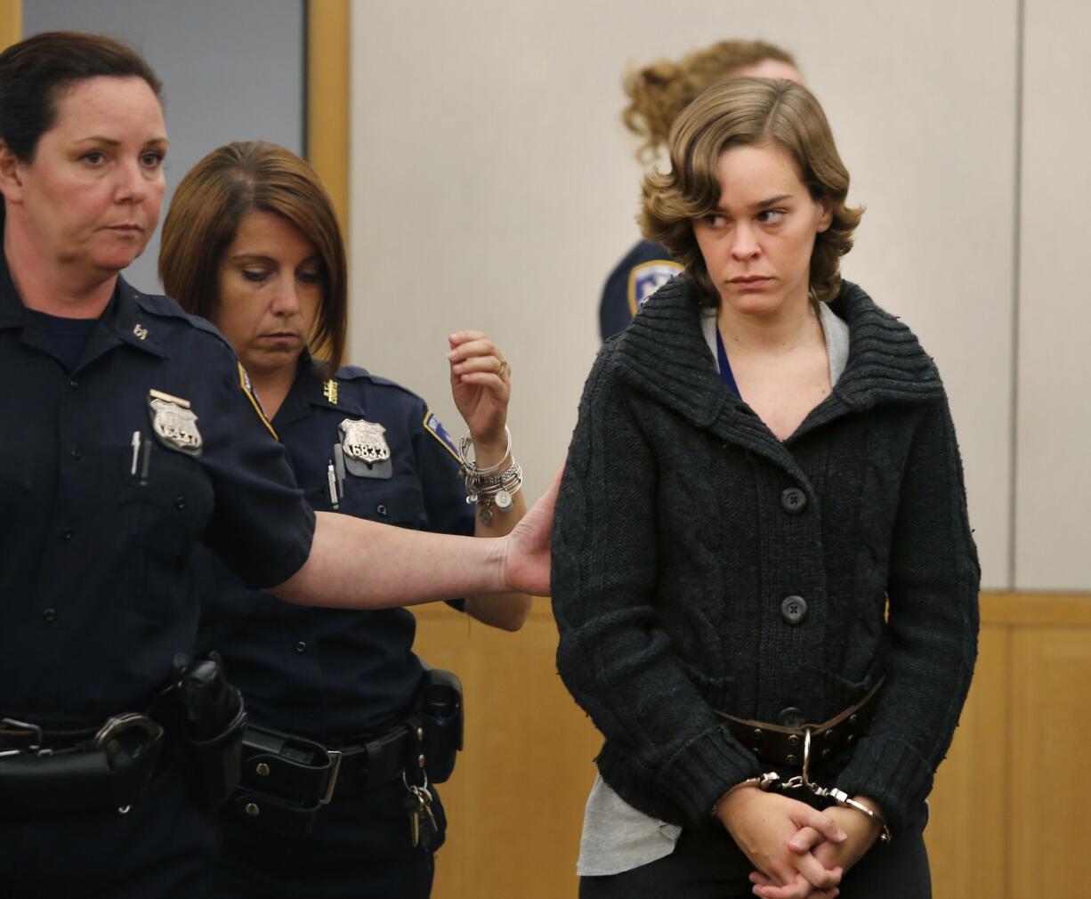 Lacey Spears is escorted into the courtroom in June at the Westchester County Courthouse in White Plains, N.Y.