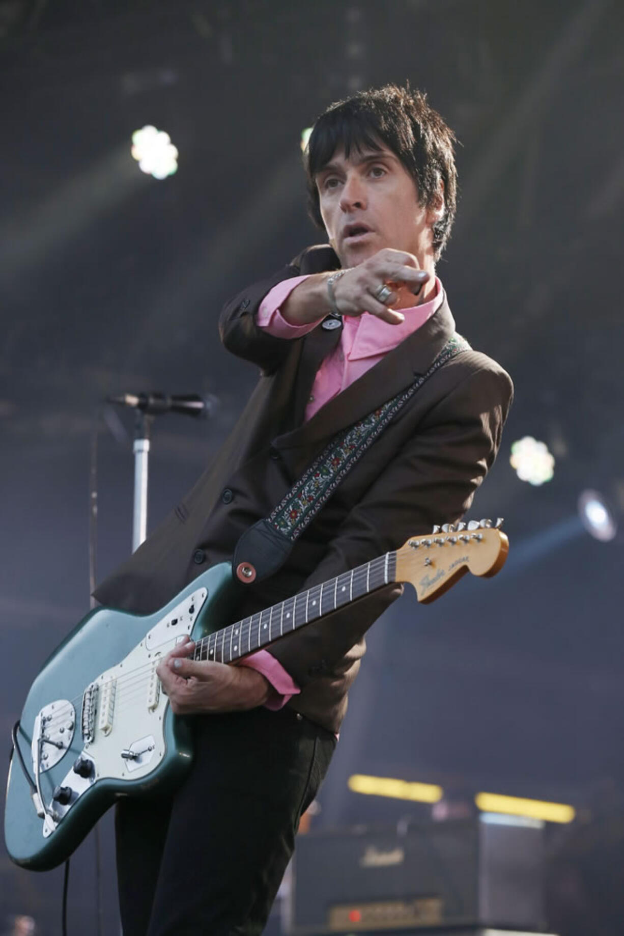 FILE - In this Aug. 1, 2014 file photo, British singer Johnny Marr performs at Camp Bestival at Lulworth Castle in Dorset, England. The former guitarist for The Smiths has just released his second solo album, &quot;Playland,&quot; a follow-up to well-received 2013 effort &quot;The Messenger.&quot; Both offer robust, richly textured guitar rock _ the latest of Marr's many musical modes.