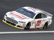 Greg Biffle (16) drives through Turn 4 during the NASCAR Sprint Showdown at Charlotte Motor Speedway in Concord, N.C., Friday, May 15, 2015. Biffle won the first segment to advance to Saturday's All-Star Race.