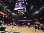 Golden State Warriors' Stephen Curry, right, competes during the NBA All-Star Saturday 3-point basketball contest Saturday, Feb. 14, 2015, in New York.