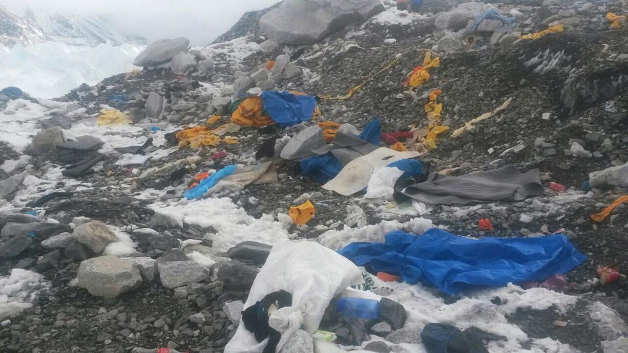 Camping gear is strewn about Everett base camp on Tuesday after an avalanche struck Saturday in Nepal.