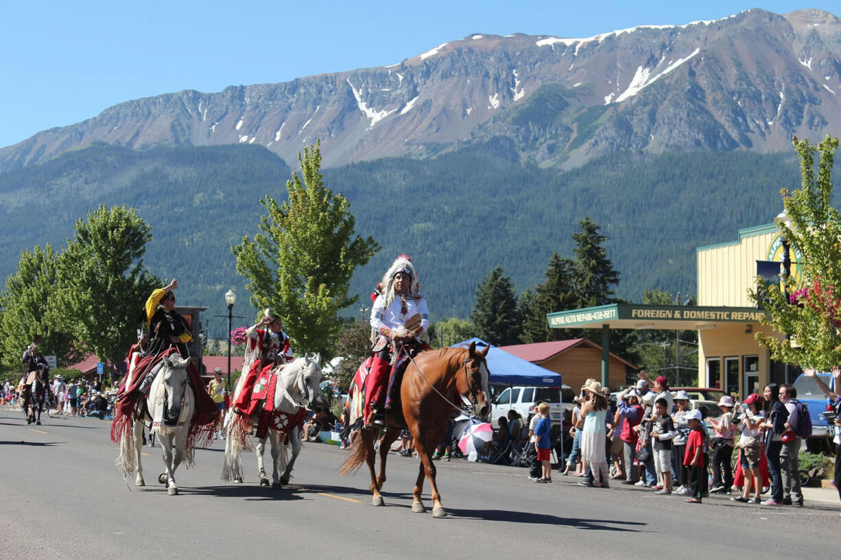 Participants ride in the annual Chief Joseph Days Parade in Joseph, Ore., on July 26.