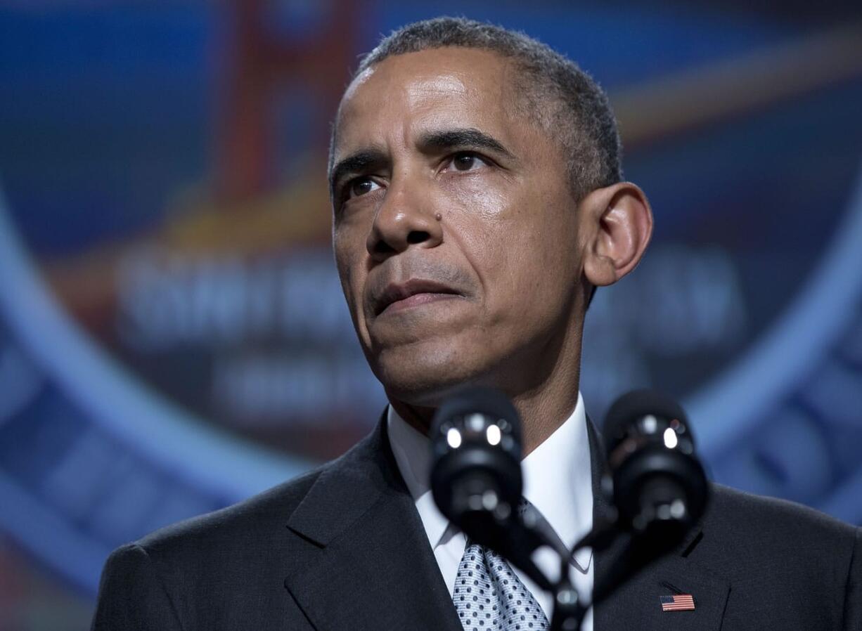 President Barack Obama pauses as he speaks about gun violence Friday at the U.S.