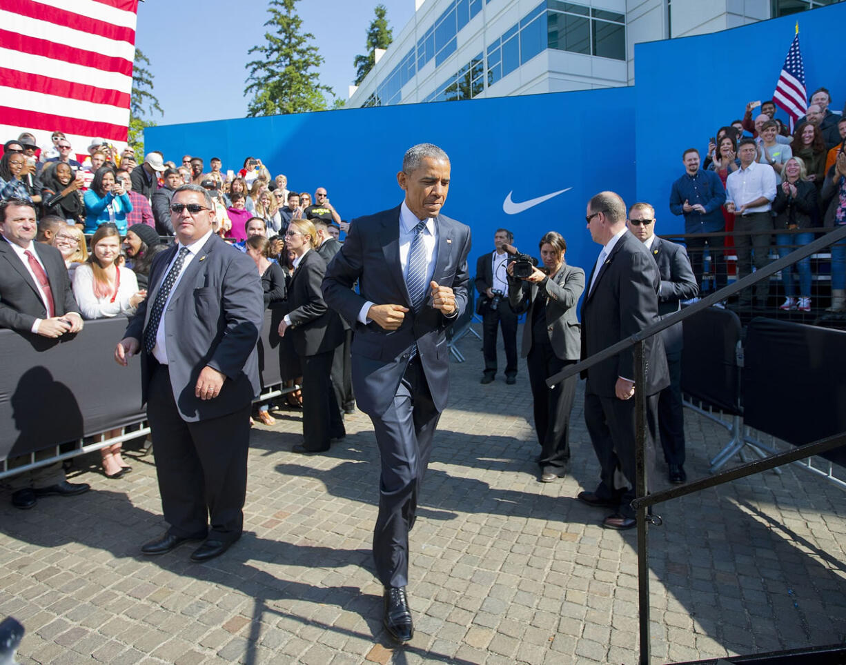 President Barack Obama takes the stage Friday before speaking at Nike headquarters in Beaverton, Ore. Obama visited the giant athletic apparel company to make his trade policy pitch as he struggles to win over Democrats for what could be the last major legislative push of his presidency.