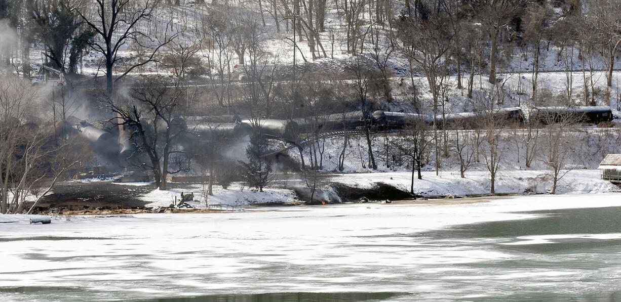 Associated Press files
A train derailment sent a tanker with crude oil into the Kanawha River on Feb. 17 near Mount Carbon, W.Va. Four trains hauling crude oil have derailed in the U.S. and Canada since mid-February, rupturing tank cars, spilling their contents, polluting waterways and igniting spectacular fires that burned for days.