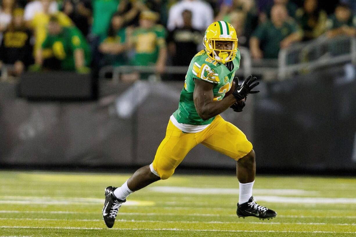 Oregon running back Royce Freeman (21) runs against Washington Oct.