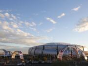 The surrounding area around University of Phoenix Stadium takes shape for Super Bowl XLIX in Glendale, Ariz. (AP Photo/Ross D.