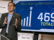 Pac-12 Commissioner Larry Scott delivers the opening remarks of the 2014 Pac-12 college football media days at Paramount Studios in Los Angeles on Wednesday.