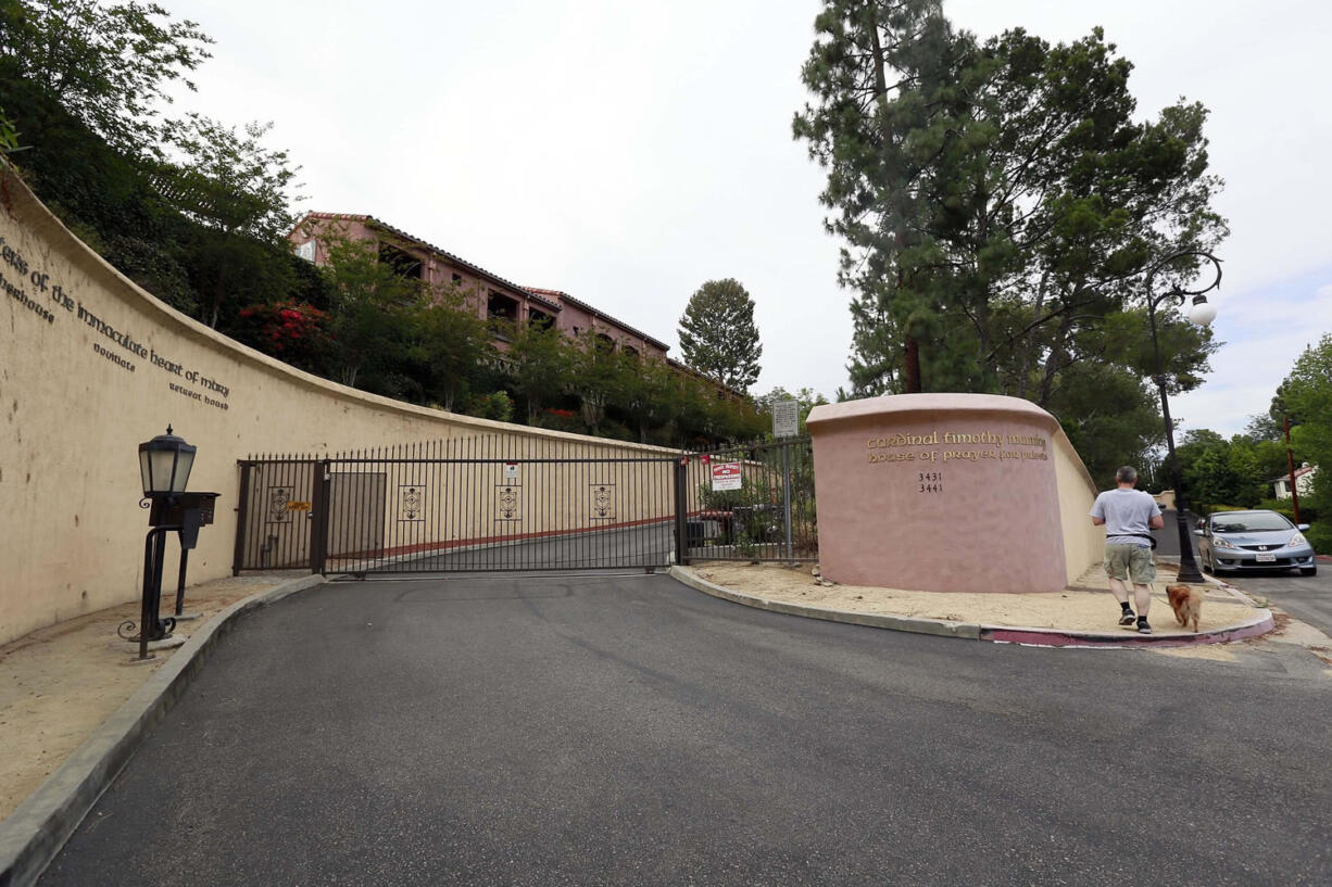 NICK UT/Associated Press
The gate to the Sisters of the Immaculate Heart of Mary property in the Los Feliz area of Los Angeles is shown Monday.