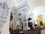 A plaque on a pillar indicates where the heart of the 19th century composer Frederic Chopin is interred in Warsaw, Poland.