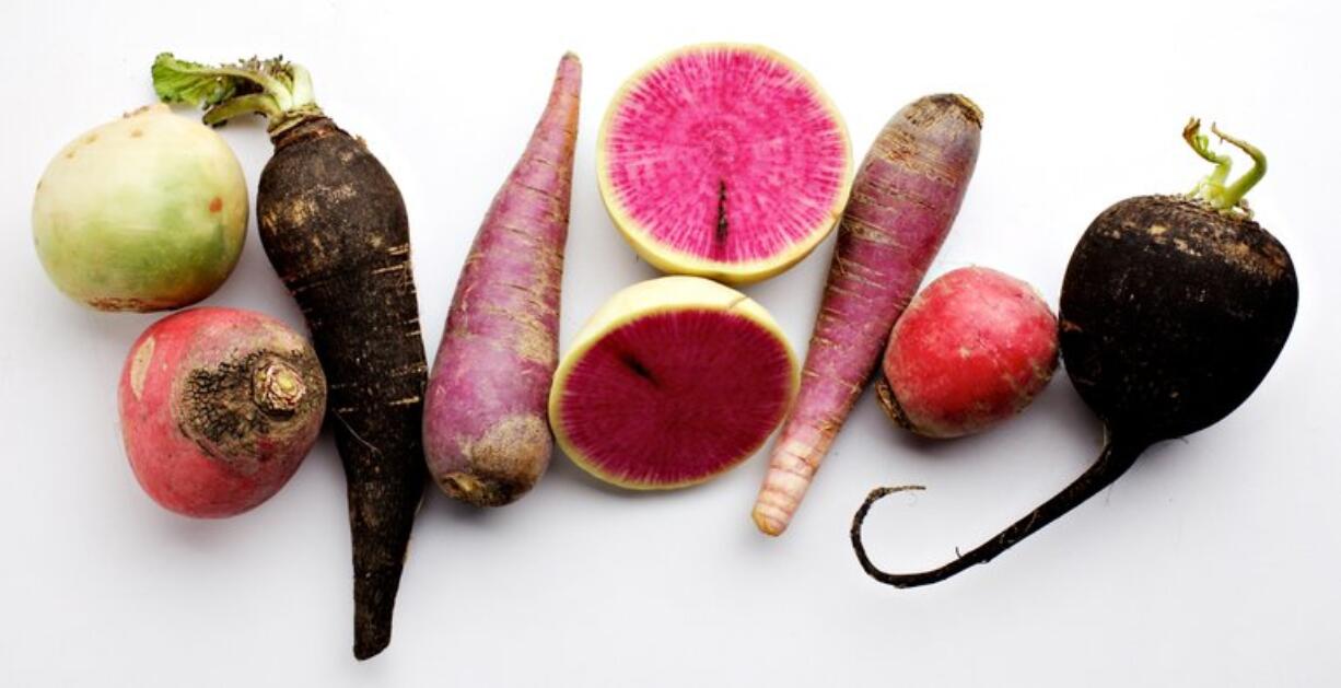 The Washington Post
Radishes can add a variety of color and pepperiness to the winter table. From bottom: Misata Rose, China Rose, Spanish Black, Hilds Blauer, a sliced Misata Rose, Hilds Blauer, China Rose and Spanish Black.