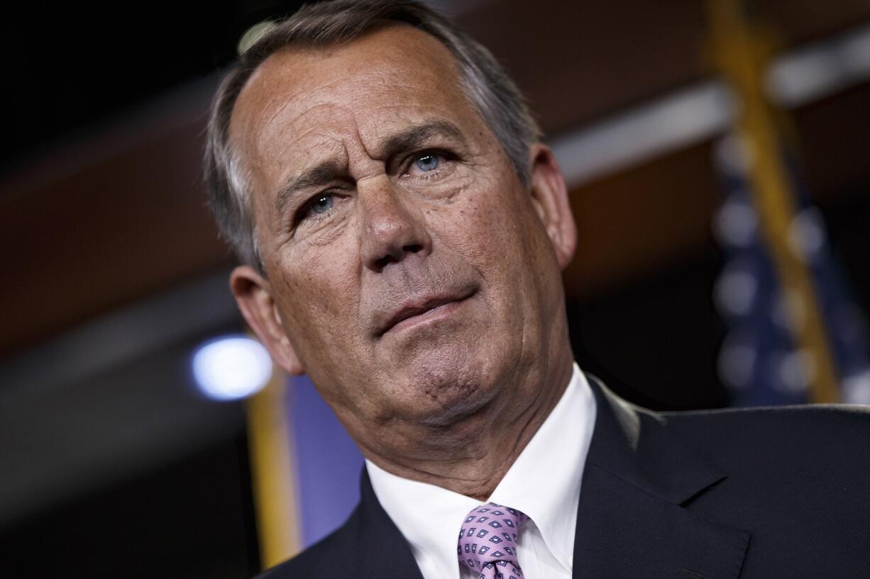 House Speaker John Boehner of Ohio meets with reporters on Capitol Hill in Washington.