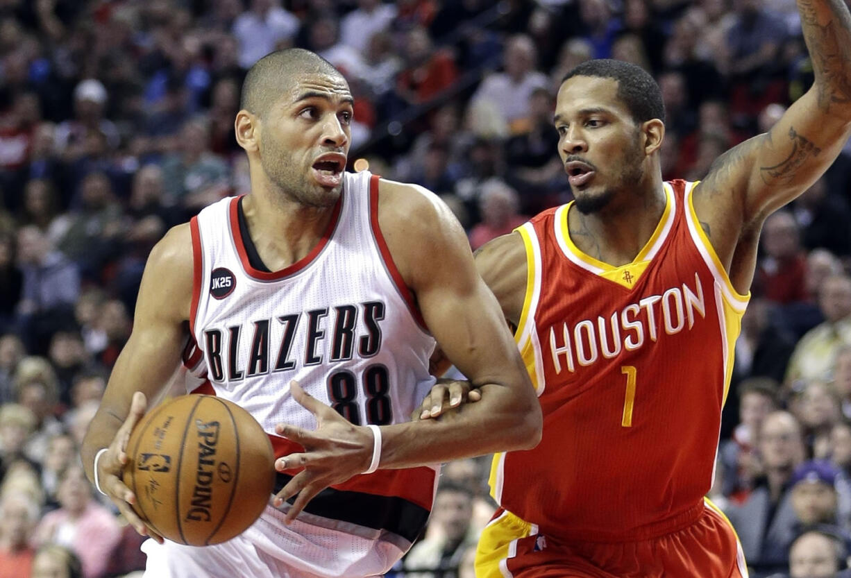 Nicolas Batum, left, spent seven years as a member of the Portland Trail Blazers.