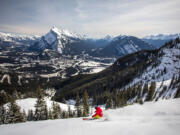 A snowboarder on the mountain in the Canadian Rockies, just 15 minutes from the town of Banff, Alberta. It?s one of a number of small resorts located near larger, big-name resorts.