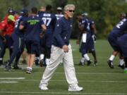 Seattle Seahawks head coach Pete Carroll walks on the field during 2015 training camp. (AP Photo/Ted S.