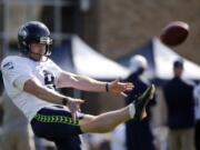 Seattle Seahawks kicker Jon Ryan practices at training camp Thursday, Aug.