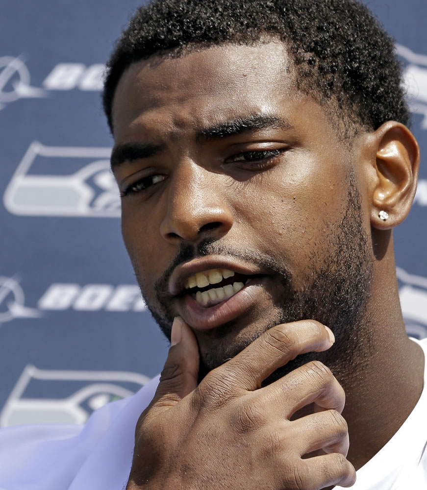 Eric Pinkins speaks with media members after taking part in drills at Seattle Seahawks rookie minicamp Sunday, May 10, 2015, in Renton.