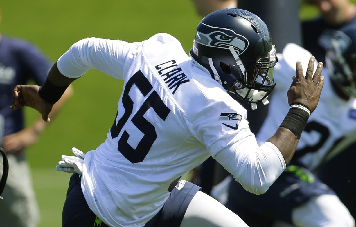 Seattle Seahawks rookie defensive end Frank Clark (55) runs a drill during NFL football rookie minicamp, Friday, May 8, 2015, in Renton.